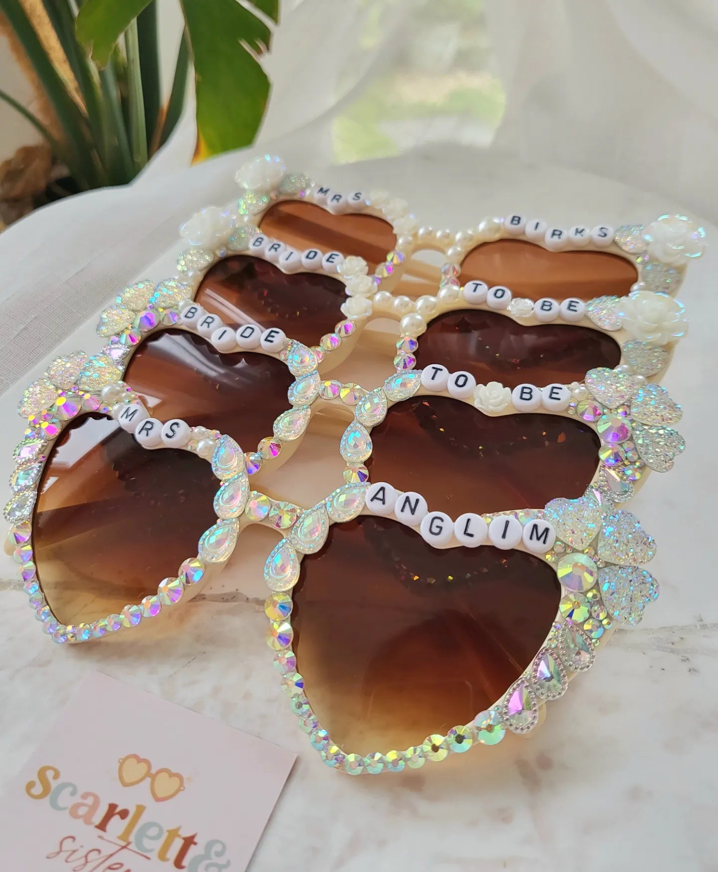 Heart shaped sunglasses with top rhinestones